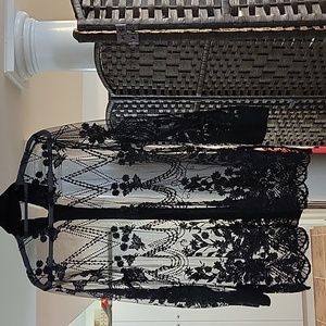 Sequined mesh shacket for evening